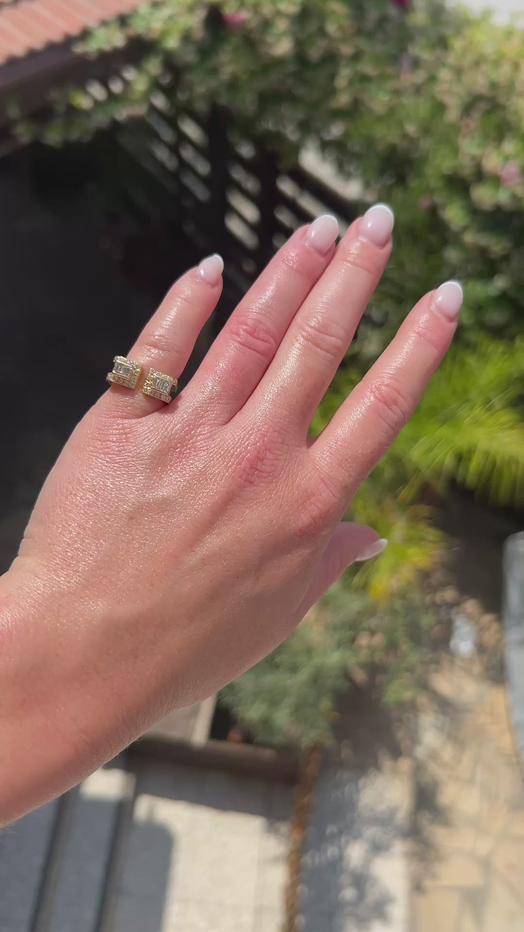 High-definition video capturing the striking avant-garde design, rich 18k gold texture, and fiery diamond brilliance of the vintage Jean Vendôme double-band ring in motion.
