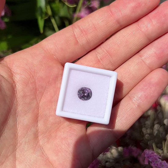 High-definition video showing the brilliant fire, lavender-purple flashes, and exceptional sparkle of the unheated 2.10ct Vietnam spinel.