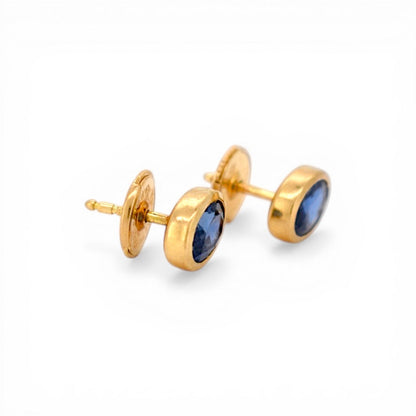 Close-up of the premium Alpa security lock system on 18k gold sapphire earrings