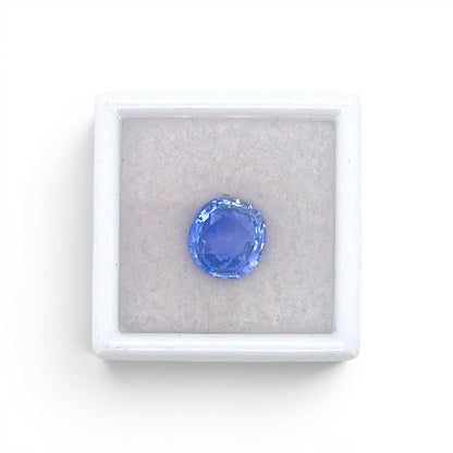 Loose 3.48 carat unheated natural round cushion cut blue sapphire gemstone from Ceylon (Sri Lanka) displayed inside a luxury presentation gem box by Antique Jewelry Finds.