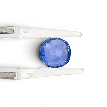 Reverse back view of the natural round cushion-shaped blue sapphire from Ceylon demonstrating its exceptional clarity, clean facets, and lack of heat treatment.