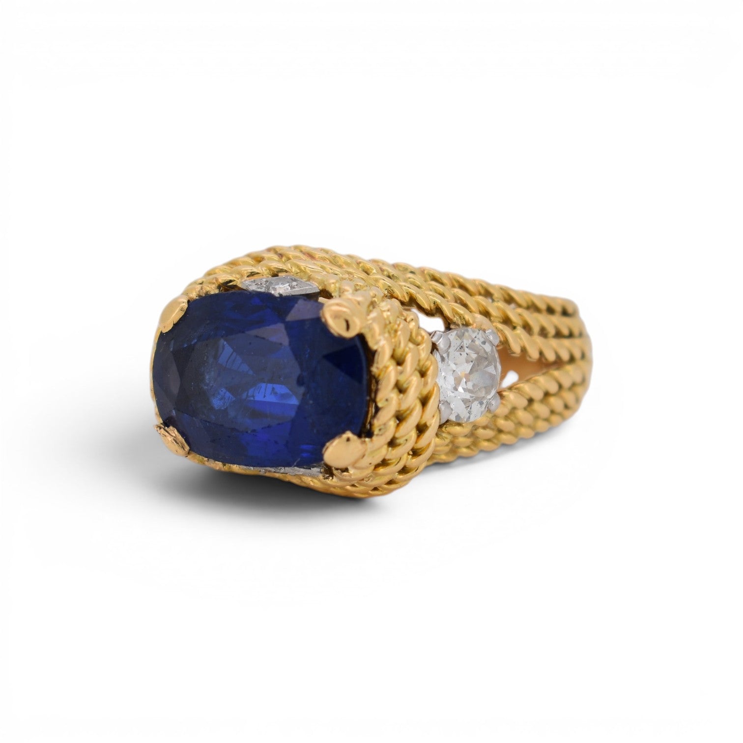 Side view of the vintage braided gold ring with unheated ceylon sapphire and old cut diamonds
