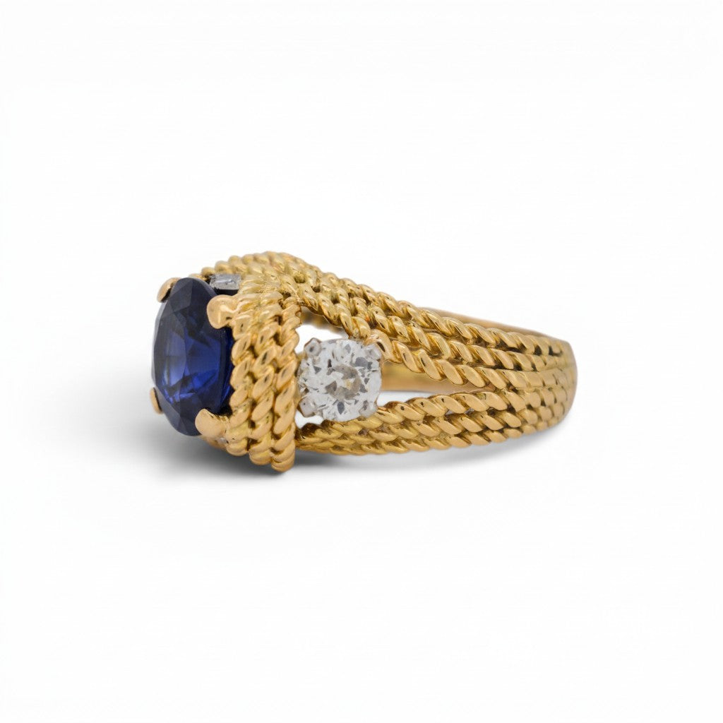 Close-up view of the fine 18k braided gold metalwork and the sparkling 1ctw antique old-cut diamonds.