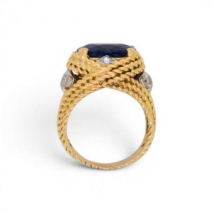 stand view of this statement vintage ring 18k gold braided with natural sapphire and diamonds