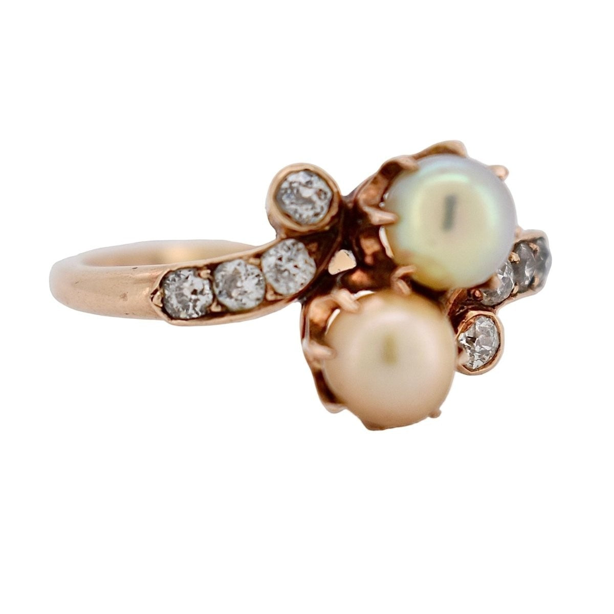 Macro shot of the two 4mm natural pearls showcasing their soft luster and skin