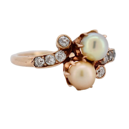 Macro shot of the two 4mm natural pearls showcasing their soft luster and skin